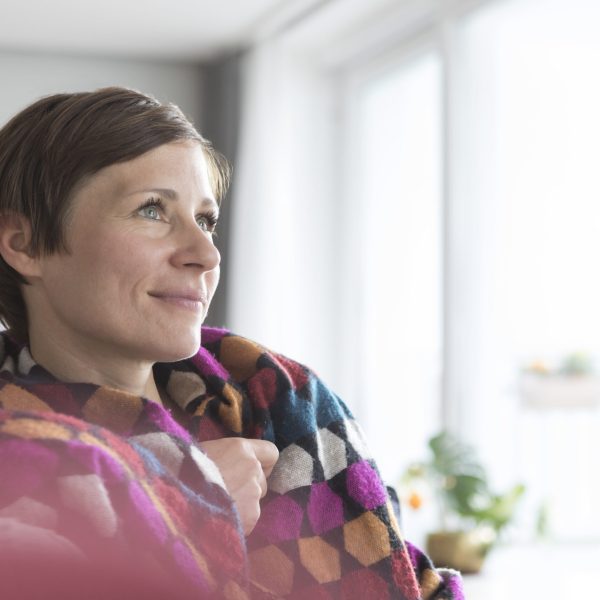 Portrait of woman relaxing at home